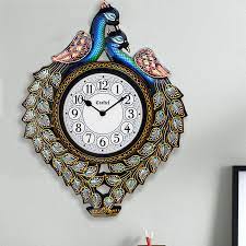 Under an agreement between nbcu and amazon. Buy Antique Handcrafted Peacock Decorative Wall Clock Online In India Wooden Street