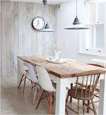 Crafted of hardwood solids, engineered wood, and veneers, the table features turned legs. Style Mix Wood Tables White Chairs Centsational Style