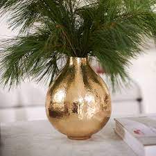 Maybe you would like to learn more about one of these? Hammered Metal Vases Gold