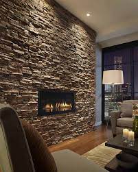 6 Amazing Living Room Wall Decor Ideas Houseminds Stone Wall Living Room Stone Walls Interior Wall Decor Living Room