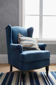 This New Small Spaces Pottery Barn Collection Is Just What Your Tiny Home Needs Pottery Barn Chair Upholstered Arm Chair Black Cafe Chairs