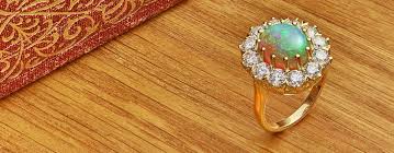 Opal engagement rings provide the best of all worlds. Bespoke Opal Rings Custom Made Opal Engagement Rings