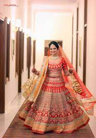 Bright Red And Gold Twirling Lehenga With Kaleere Bridal Lehenga Red Indian Bridal Wear Indian Bridal Dress