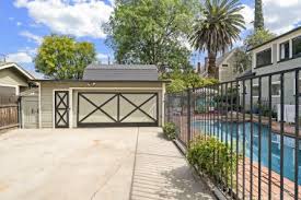 The standard two car garage width can be as short as 20 ft. Wide Driveway And 2 Car Garage Off Of Ramona Drive The Sister Team