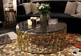 Round center tables are great for families with young children, the elderly, and with pets, as there are no sharp edges to cause. 5 Round Center Table For A Modern Living Room 3 Brabbu Design Forces