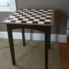 A 12 Thrift Store Table And A Little Paint And Time Resulted In This Chess Checkerboard Table For The Deck Checkerboard Table Gaming Decor Diy Furniture