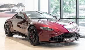 Image result for Divine Red 2023 Aston Martin