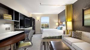 Home2 By Hilton Business Services High Tech Amenities Cheap Interior Design Affordable Interior Design Modern Master Bedroom
