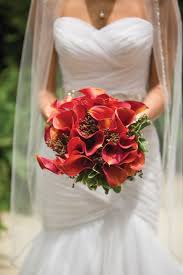 How to easily make a wedding bouquet using calla lilies. Red Calla Lily Bridal Bouquet