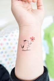 Cat and flowers tattoo design. A Cat Tattoos Guide To Help You Choose