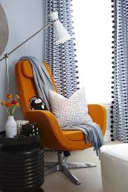 Blue Walls Painted Para Paints Oxford Orange Ikea Arvika Swivel Chair Glossy Black Ribbed Accent Table And Wh Living Room Diy Living Room Upgrades Home Decor