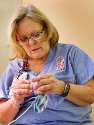 Mandy Harris saved 700 Riley babies. Now her colleagues will crochet 700+  jellyfish for preemies in her memory