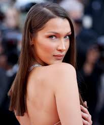 Andreas rentzgetty images for years, bella hadid has been darkening her hair jet black or chocolate brown—a point of differentiation from her honey blonde sister gigi and a reflection, she has. Bella Hadid Dyes Hair Bright Red Color In New Instagram