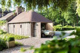 Klassieke Eiken Houten Carport In Engelse Landelijke Stijl Op Maat Gemaakt Functioneel Stijlvol En Tijdloos Design A Carport Tuinhuizen Terrasoverkapping
