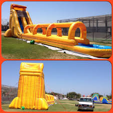 The Fire Super Giant Wave Slip And Slide Is The Biggest Longest And Tallest Inflatable Water Sli Inflatable Water Slide Water Slide Bounce House Water Slides