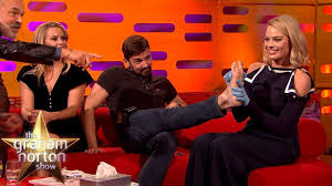 Cara delevingne and margot robbie have a lot in common. Margot Robbie Tattoos Fan On The Graham Norton Show Teen Vogue