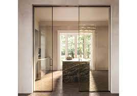 Frameless glass shower door is a common option for bathrooms. Manhattan Line Henry Glass Door Milia Shop
