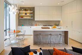 The kitchen cabinets match the flooring in terms of colors and they offer a good amount of open and closed storage. The Benefits Of Open Shelving In The Kitchen Hgtv S Decorating Design Blog Hgtv