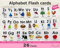 These simple uppercase alphabet cards with large, clear letters are great for alphabet activities and songs! Alphabet Flash Cards Printable Alphabet Picture Flashcards Etsy