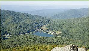 Peaks Of Otter Nestled Between Two Of The Three Mountains That Make Up The Peaks Of Otter Is The Peaks Of Otter Lodge Blue Ridge Parkway Blue Ridge Roanoke Va