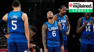 Olympic women's basketball team photo, 2004 edition, wearing bright red jerseys. Explained Why Us Basketball Team S Defeat To France Is Not Such A Huge Surprise Explained News The Indian Express