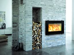 The fireplace is designed by the danish architect torben madsen. Danish Wood Fireplace Counter Weighted Glass Door Raises Upwards Wood Burning Fireplace Inserts Wood Burning Fireplace Contemporary Fireplace Designs