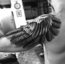I would alter the last half or so of each feather to all black. The 109 Best Wing Tattoos For Men Improb