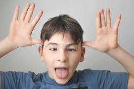 Silly Boy Making Face Sticking His Tongue Out Photos Free Royalty Free Stock Photos From Dreamstime