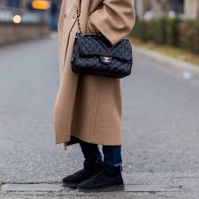 The boots feature the logo printed in white at sides. Stylish Ways To Wear Uggs Popsugar Fashion