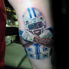 American football tattoos that you can filter by style, body part and size, and order by date or score. 70 Football Tattoos For Men Nfl Ink Design Ideas