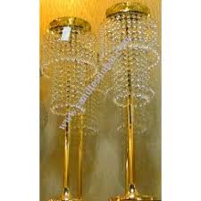 The base of the shiny gold pedestal is 4 1/2 in diameter. Candle Holders Candle Accessories In Dubai At Candles Dubai Candle Holders In Gold Silver Glass Hurricane Candle Holders N Lamps Candelabra For Hotel Spa Parties Events