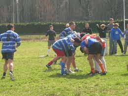 A sport where players can hold or kick an ovoid ball. Rugby Wiktionary