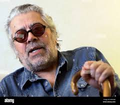 Argentinean singer and songwriter Facundo Cabral speaks during an interview  with The Associated Press in Miami, Thursday, Aug. 7, 2008. Cabral will be  presenting his "Antologia 1960-2008" show this weekend in Miami