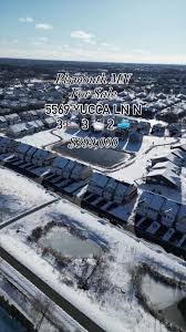 Welcome home to your charming retreat at 5569 Yucca Lane N! This townhome  offers comfort and convenience, with an open-concept living area, modern  kitchen, spacious master suite, and private patio. ...