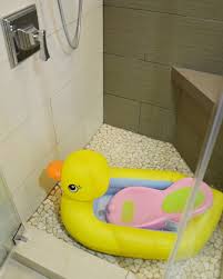 I loved the little tub my mom picked up at a yard sale for $2 in maine and used with petra for the first couple months of her life. Traveling With Baby How To Bath A Baby In A Room Without A Tub Brie Brie Blooms