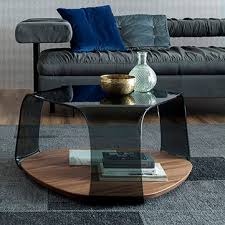 Rated 4.5 out of 5 stars. Contemporary Coffee Table Chakra Tonin Casa Wooden Curved Glass