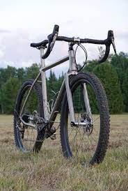 Thunderhawk Titanium Gravel Bike Adventure 650b Road Plus Bike Roadbikewomenroadbikeforbeginners Gravel Bike Gravel Bike Bicycles Adventure Bike Cycling
