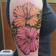 Everything from the hair to the flowers was perfectly executed. 35 Black Grey And Colorful Hibiscus Tattoos
