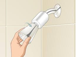 Now, pour enough white vinegar (yes, the normal white vinegar that you have laying around your house!) onto the baking soda. 3 Ways To Prevent Limescale On A Shower Screen Wikihow