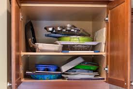 Introduction cookie sheets, cutting boards, cooling racks, serving trays, pizza peels…most of us have a disorderly pile of large, flat cookware—and the. Kitchen Diy Adding Cookie Sheet Tray Storage Above The Oven Taking On Today