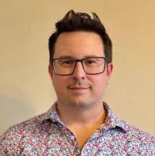 Local artist paints spectacular mural Wisconsin Badgers use for recruiting 