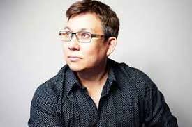 羅百吉= D.J.Jerry