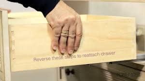 Grasp any jammed paper from the input tray area with both hands, and then pull the paper slowly but firmly toward you to remove it. How To Remove Dresser Drawer With Center Metal Slide