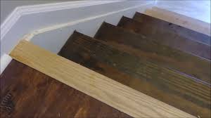 Push the stairnose into the track from left to right. Transition Between Laminate Floor To Stairs Installation Of Stair Nose Youtube
