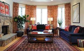 Decorating with antique rugs (image via apartment therapy) 1. How To Decorate Your Room With Transitional Rugs Rugs In Living Room Modern Living Room Interior Blue Couch Living Room