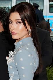 Hailey Baldwin Straight Dark Brown Overgrown Bangs, Pinned-Back Hairstyle