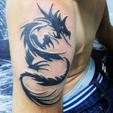 Best on the top of the shoulder. 60 Tribal Dragon Tattoo Designs For Men Mythological Ink Ideas