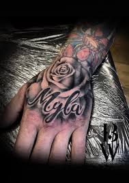 Rose Hand Tattoo Men S Tattoo Child S Name By Beth Wilde Wilde Ink Wakefield Hand Tattoos For Guys Rose Hand Tattoo Hand Tattoos For Women