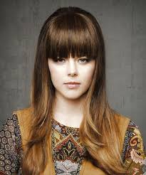 Section off fringe at front of hair. Long Straight Brunette Hairstyle With Blunt Cut Bangs
