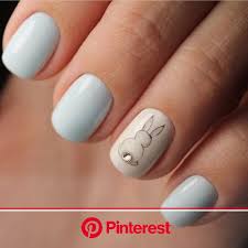 Next time you're in the mood for nail art, paint all ten nails and try giving just one of them a little extra pizzazz. This Accent Nail Has A Bunny With A Diamond Tail In 2020 Easter Nail Art Designs Easter Nail Designs Bunny Nails Clara Beauty My